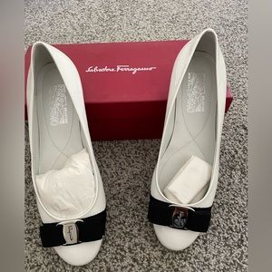 Brand new never been worn Ferragamo white flats